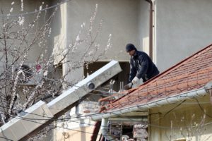 man-working-on-roof